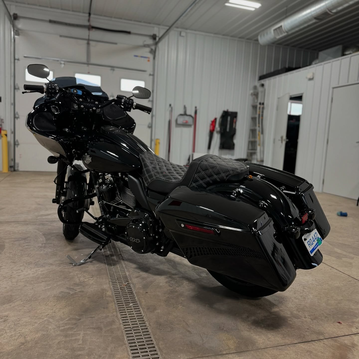 Black motorcycle ceramic coating install, high gloss finish, Michigan