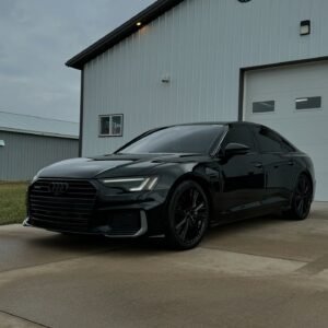 Black sedan with coated paint and PPF, matched system, Michigan