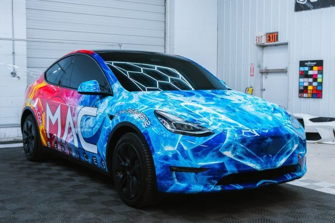 MAC Services Tesla commercial car wrap, brand graphics, Michigan